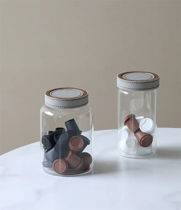 Leather-Lidded Glass Storage Jars, Set of Two in slate — in a room setting