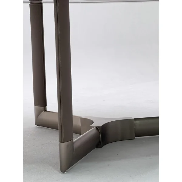 Sintered Stone Round Table with Leather-Wrapped Tripod Base in ivory — in a room setting