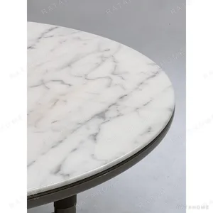 Sintered Stone Round Table with Leather-Wrapped Tripod Base in ivory — in a room setting
