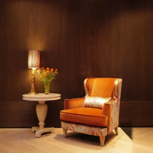 Legacy 28 Wingback Armchair in Golden Orange Velvet — front view