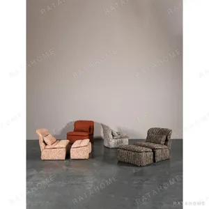 Leisure Lounge Chair with Ottoman in Orange Corduroy — in a room setting