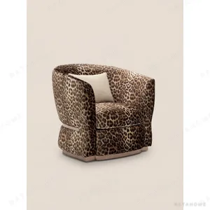 Leopard Velvet Tub Chair with Metal Trim Base in clay — in a room setting