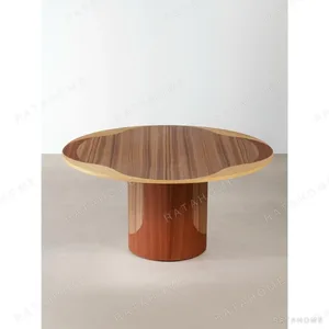 Inlaid Round Dining Table on Fluted Pedestal in natural oak — in a room setting