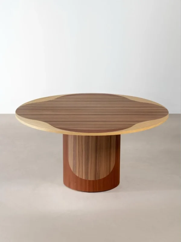 Inlaid Round Dining Table on Fluted Pedestal in natural oak — in a room setting