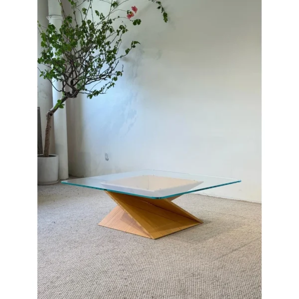 Spiral Wood Base Glass Coffee Table, 105 cm in natural oak — in a room setting