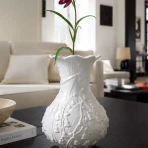 Lily of the Valley Relief White Ceramic Vase in ivory — in a room setting