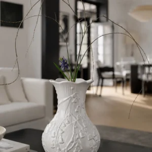 Lily of the Valley Relief White Ceramic Vase in ivory — in a room setting