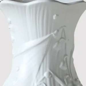 Lily of the Valley Relief White Ceramic Vase in ivory — in a room setting