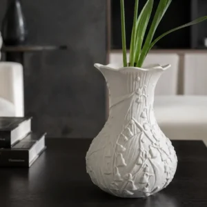 Lily of the Valley Relief White Ceramic Vase in ivory — in a room setting