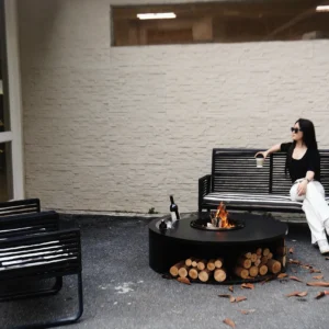 Round Outdoor Wood-Burning Fire Pit in black — front view