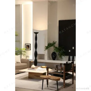 Twisted Black Column Floor Lamp with Uplight in black — in a room setting