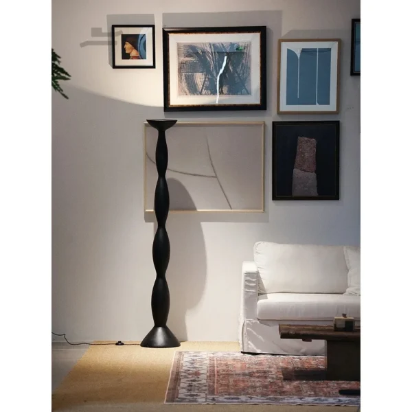 Twisted Black Column Floor Lamp with Uplight in black — in a room setting