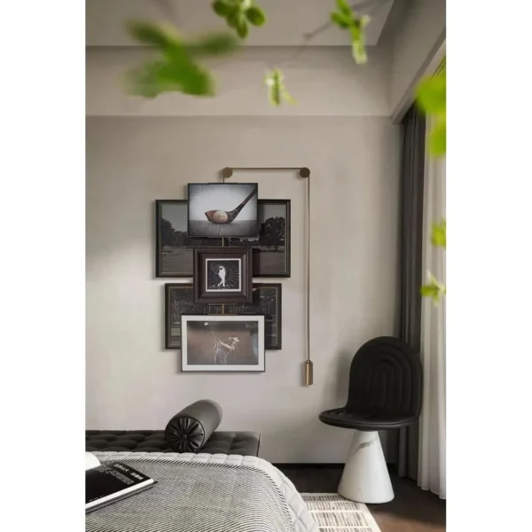 Gallery Wall Art Set of 4 on Brass Hanging Rail in black — in a room setting