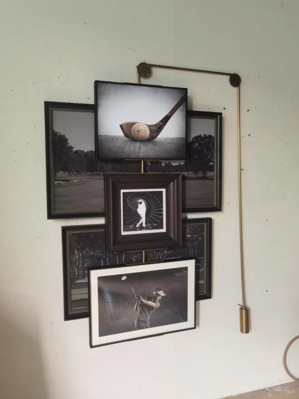 Gallery Wall Art Set of 4 on Brass Hanging Rail in black — in a room setting