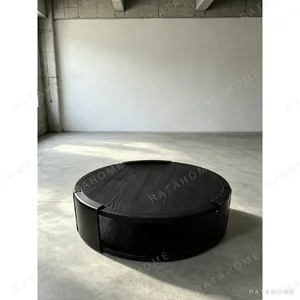 Black Ash Round Coffee Table with Copper Inlay, 150 cm in black — in a room setting