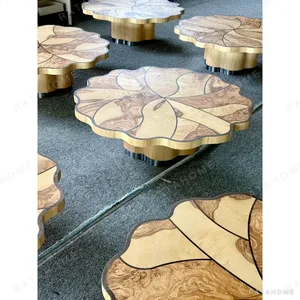 Lotus Leaf Burl Marquetry Coffee Table on Fluted Base in clay — in a room setting