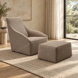 Taupe Fabric Wing Lounge Chair with Ottoman, 76 cm in sand — in a room setting