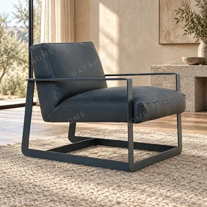 Navy Leather Lounge Chair on Black Metal Sled Base, 70 cm in blue — in a room setting