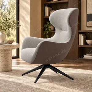 Two-Tone Grey Wingback Swivel Lounge Chair in slate — in a room setting