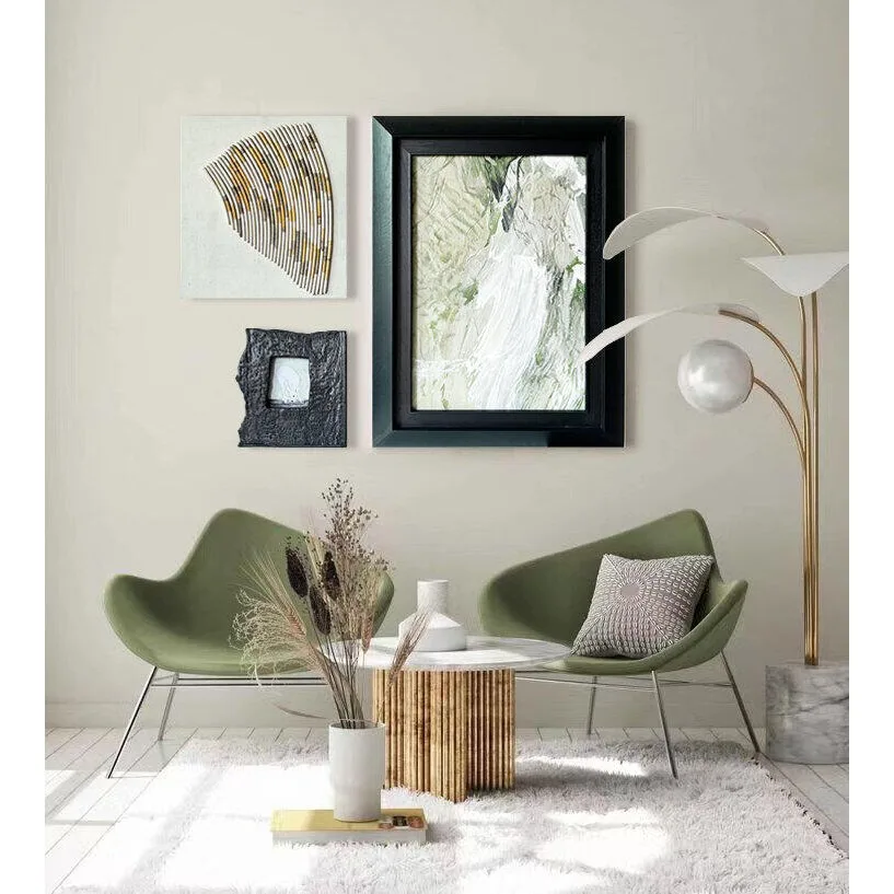 Green and Gold Wall Art Set of 3 in Black Frames — in a room setting