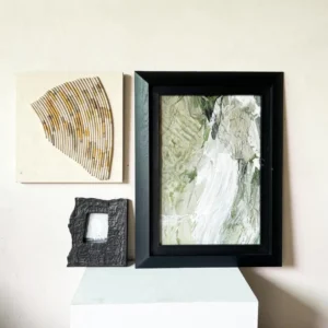 Green and Gold Wall Art Set of 3 in Black Frames — in a room setting