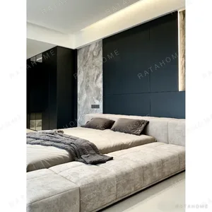 Low Wide-Ledge Upholstered Platform Bed in sand — in a room setting