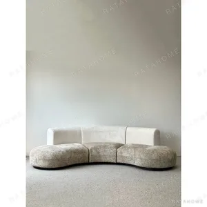 Low-Saturation French Curved Sofa in Two-Tone Cream Bouclé — in a room setting
