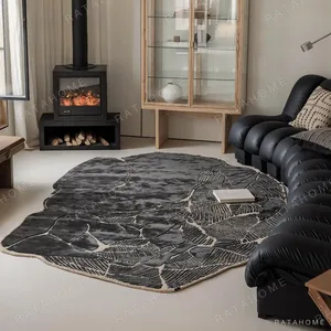 Custom Art Rug in Cracked Stone Form, Charcoal and Cream — in a room setting