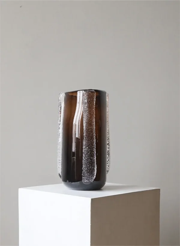 Dark Brown Glass Vase in clay — in a room setting