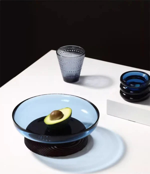 Ribbed Amber Glass Footed Fruit Bowl, Short or Tall in clay — in a room setting