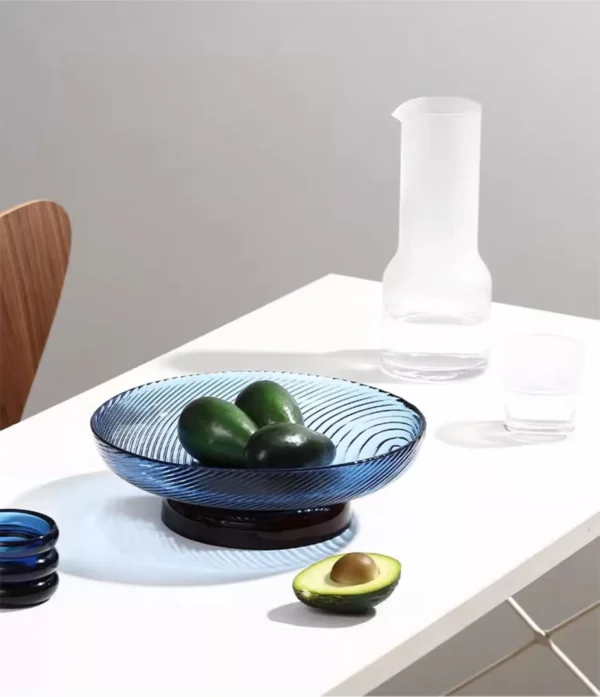 Ribbed Amber Glass Footed Fruit Bowl, Short or Tall in clay — in a room setting