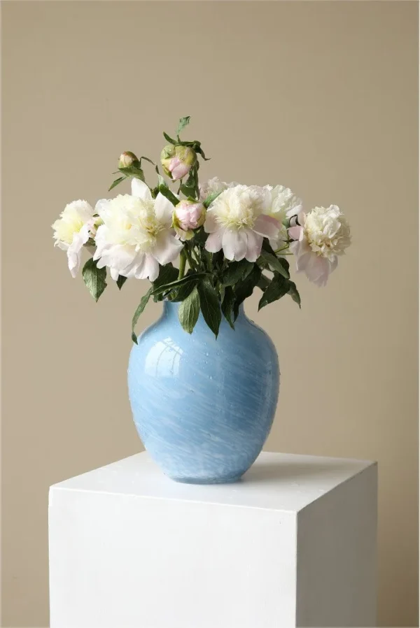 Cloud Texture Blue Glass Peony Vase, Medium in blue — in a room setting