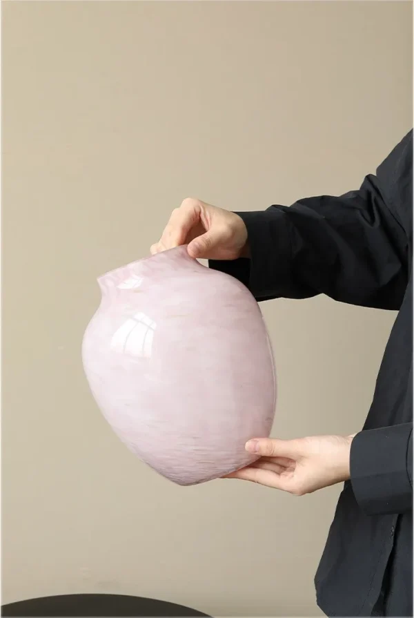 Cloud Texture Pale Pink Round-Belly Glass Vase, Medium in rose stone — in a room setting