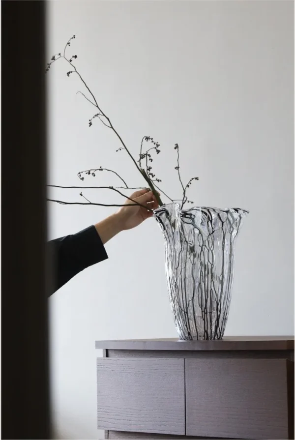 Black Line Ruffled Glass Vase, Large in ivory — in a room setting