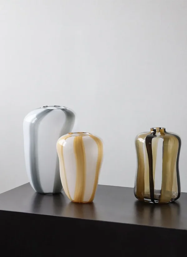 Striped Cast Glass Vases in mustard — in a room setting