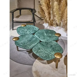 Flower Leaf Green and Terracotta Stone Coffee Table Set in olive — in a room setting