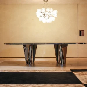 Mirror-Polished Steel Dining Table with Faceted Pedestals in silver — front view