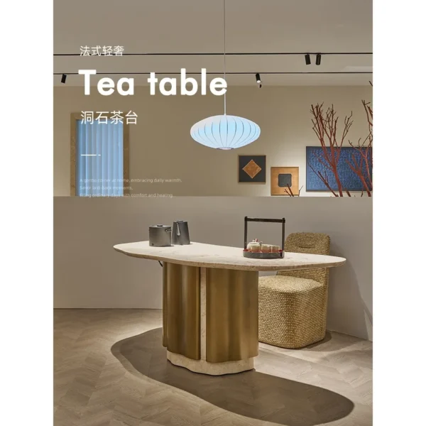 French Pink Stone Tea Table on Bronze Column in rose stone — in a room setting