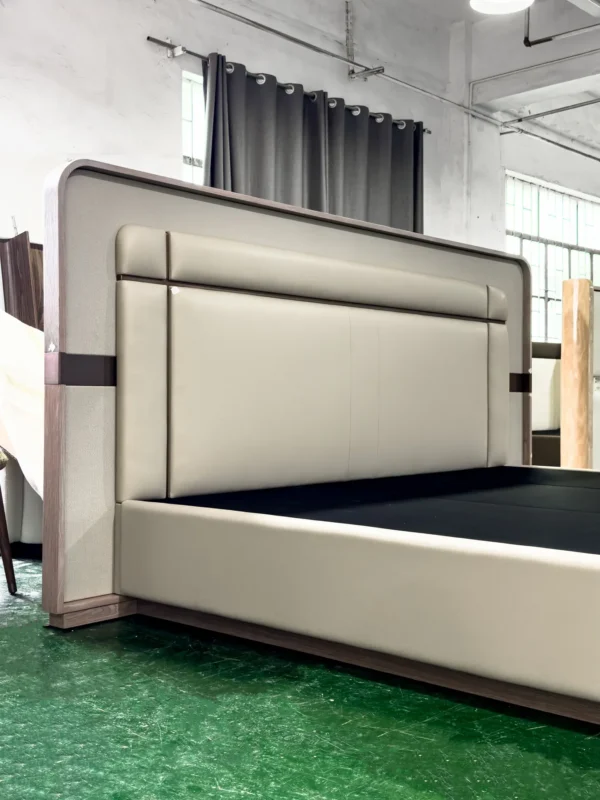Cream Leather Bed with Sectioned Headboard and Metal Inlay in oatmeal — detail