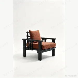 Maen Black Ash Spindle Lounge Chair in Rust Fabric, 78 cm — in a room setting