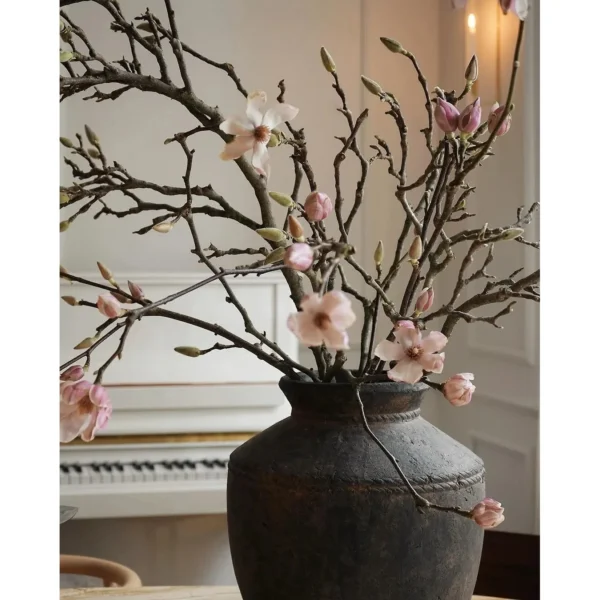 Rustic Iron-Glaze Round Jar Vase for Magnolia Branches in clay — in a room setting