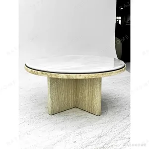 Round Ice Jade Marble Coffee Table in ivory — in a room setting