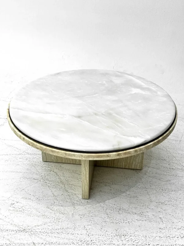 Round Ice Jade Marble Coffee Table in ivory — in a room setting