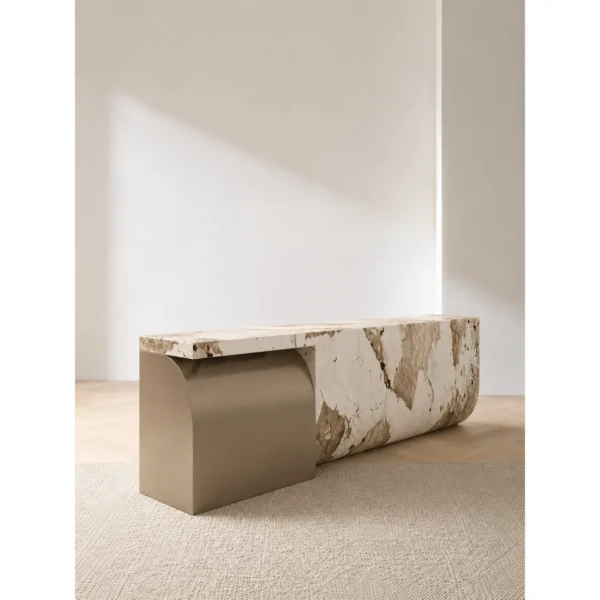 Curved Marble Reception Desk with Brushed Metal Wrap in sand — in a room setting