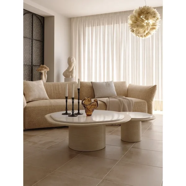 Marble and Travertine Nesting Coffee Table Pair in oatmeal — in a room setting