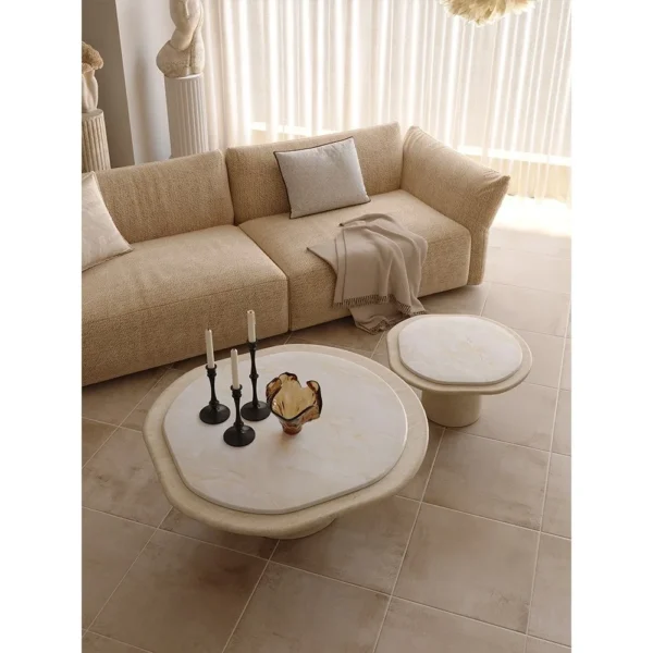 Marble and Travertine Nesting Coffee Table Pair in oatmeal — in a room setting