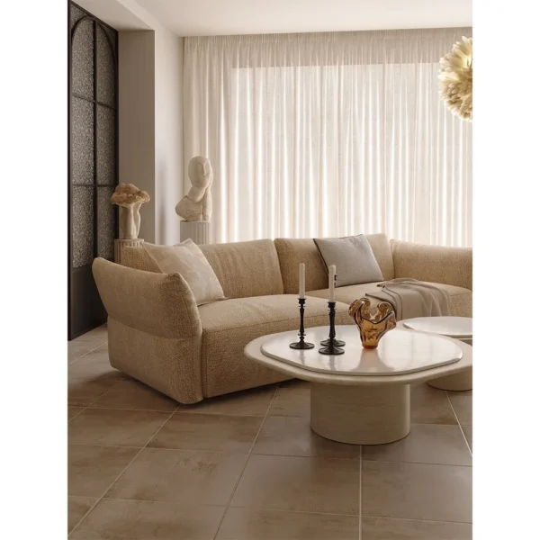 Marble and Travertine Nesting Coffee Table Pair in oatmeal — in a room setting