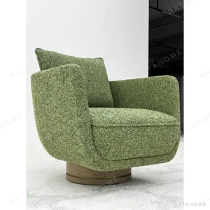 Matcha Green Coarse-Weave Swivel Lounge Chair on Wood Base in olive — in a room setting