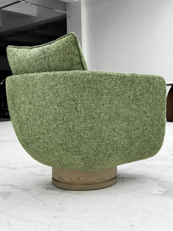 Matcha Green Coarse-Weave Swivel Lounge Chair on Wood Base in olive — in a room setting