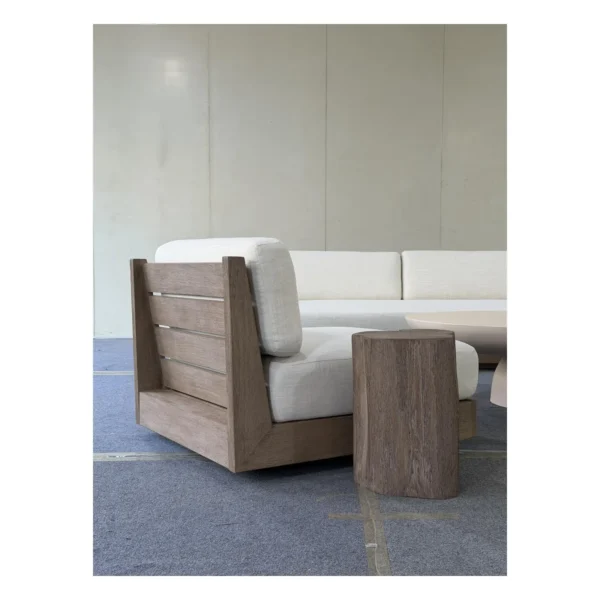 Floating Teak Outdoor Modular Sofa Set with Swivel Chairs in clay — in a room setting